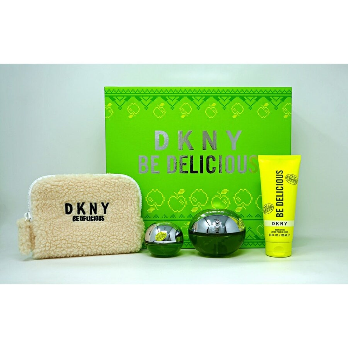 DKNY Be Delicious 4 piece fragrance gift set with 3.4 oz Eau de Parfum, body lotion, mini perfume, and pouch