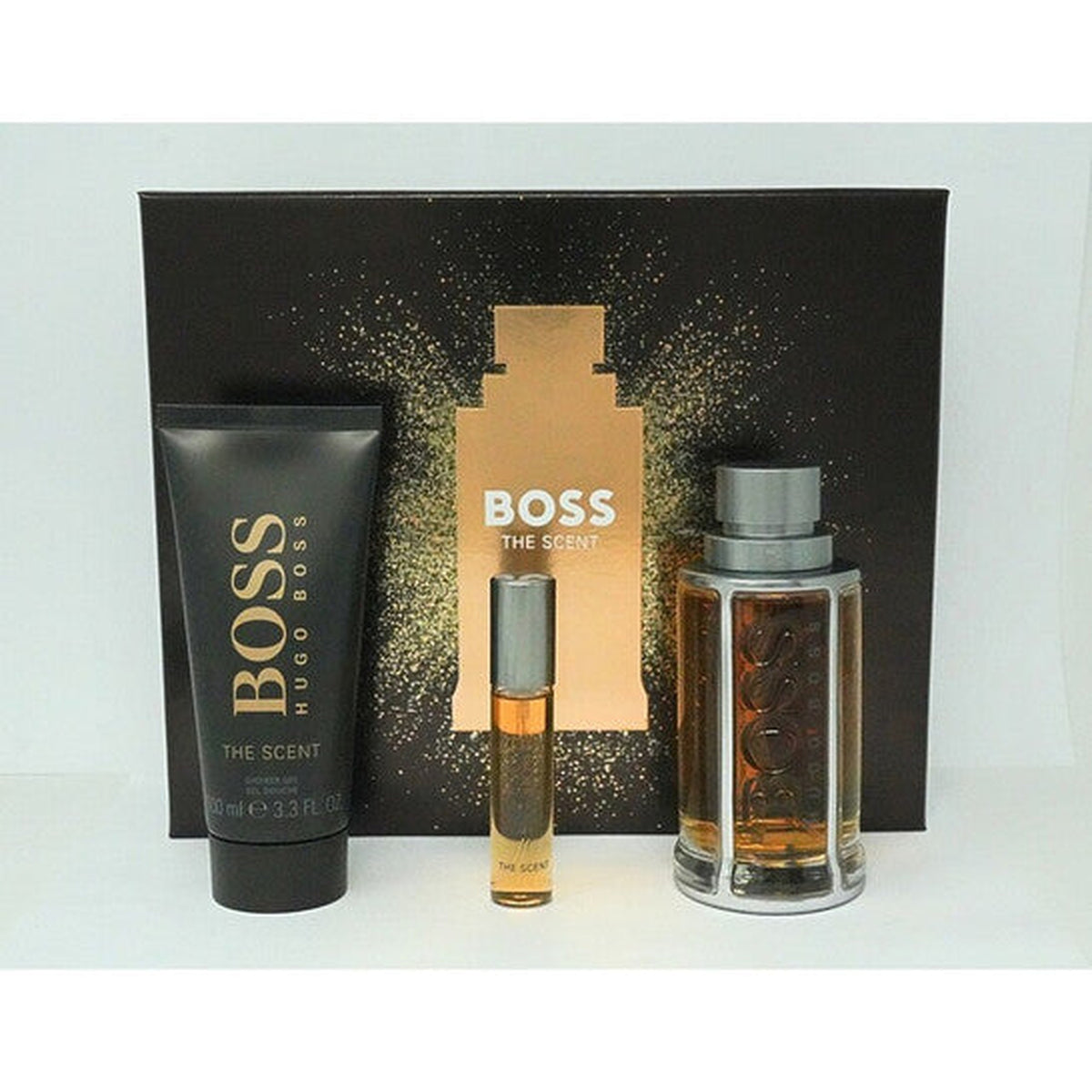 Hugo Boss The Scent 3 piece men’s fragrance gift set with 3.4 oz Eau de Toilette, shower gel, and 10 ml mini bottle