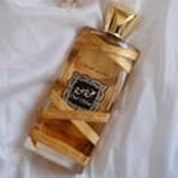 Lattafa Oud Mood Elixir 3.4 oz Eau de Parfum spray bottle